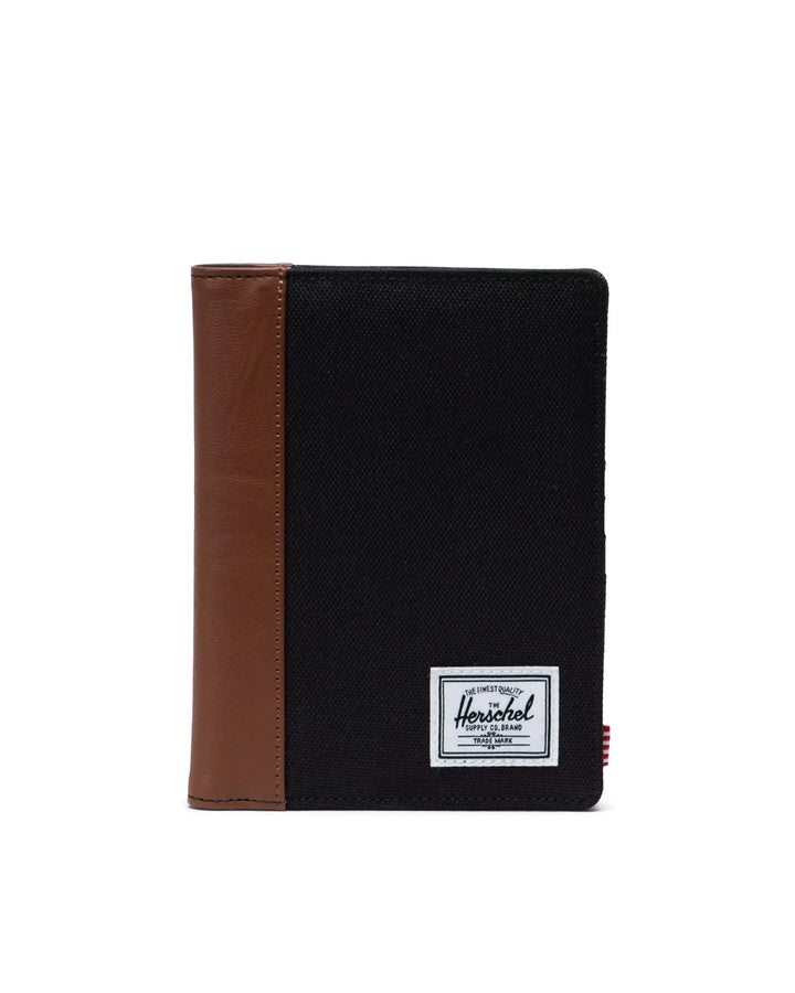 RAYNOR PASSPORT HOLDER (BLACK/TAN) - HERSCHEL