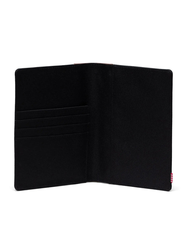 RAYNOR PASSPORT HOLDER (BLACK/TAN) - HERSCHEL