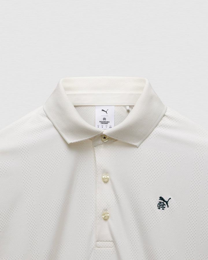 PUMA X RC MATTR JACQUARD POLO (WARM WHITE) - REIGNING CHAMP
