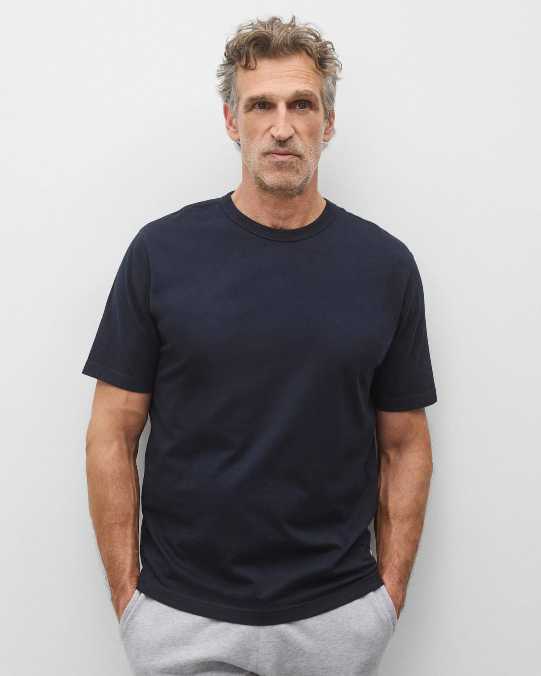 STANDARD JERSEY T-SHIRT (NAVY) - REIGNING CHAMP