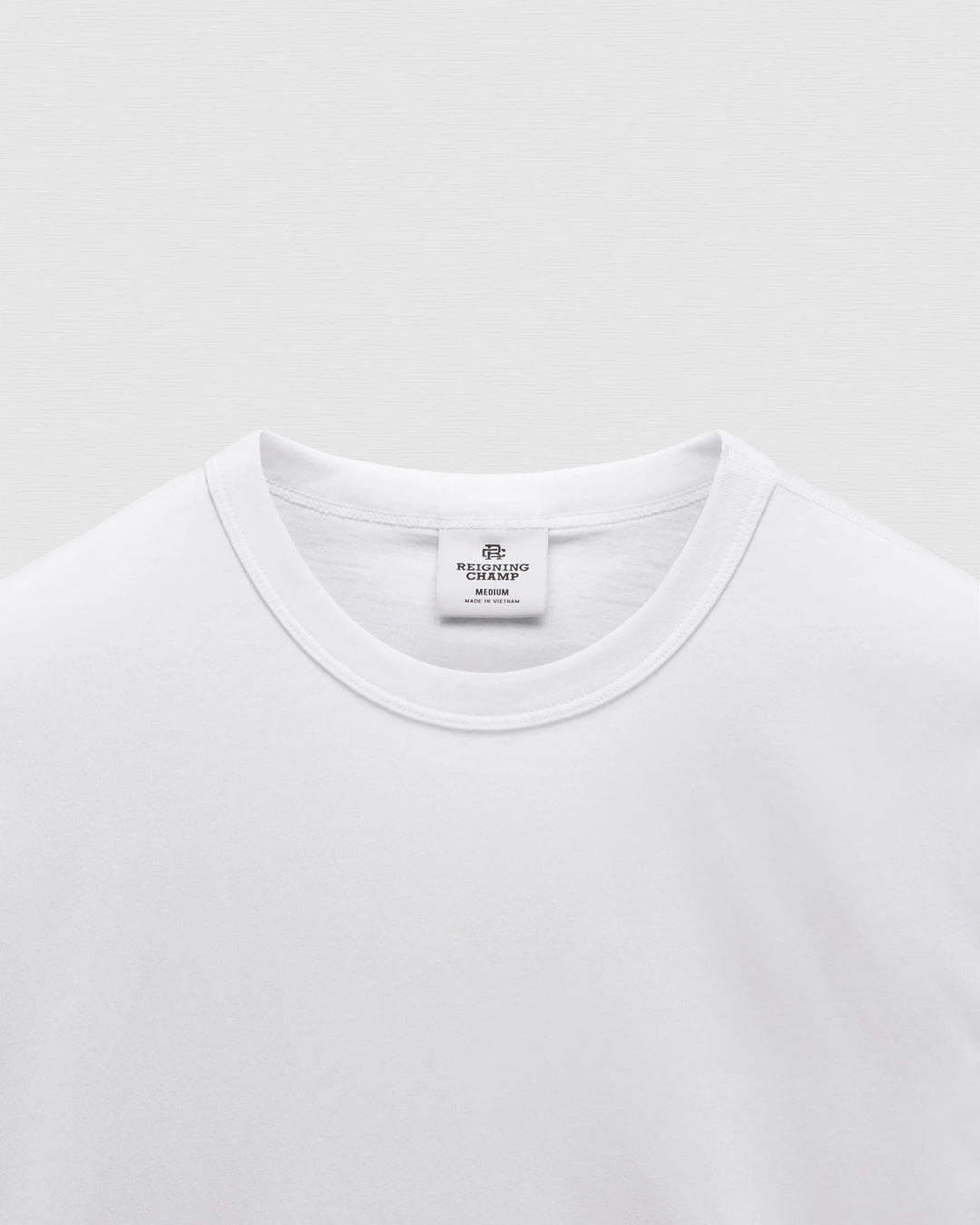 STANDARD JERSEY T-SHIRT (WHITE) - REIGNING CHAMP